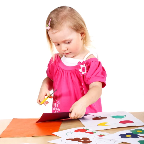 Kind met gekleurd papier — Stockfoto