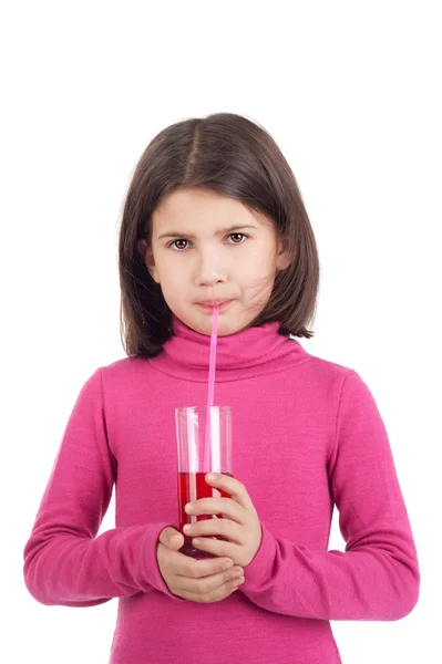 Menina que bebe suco — Fotografia de Stock