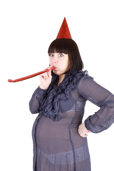 Pregnant woman with the holiday cap and tube — Stock Photo, Image