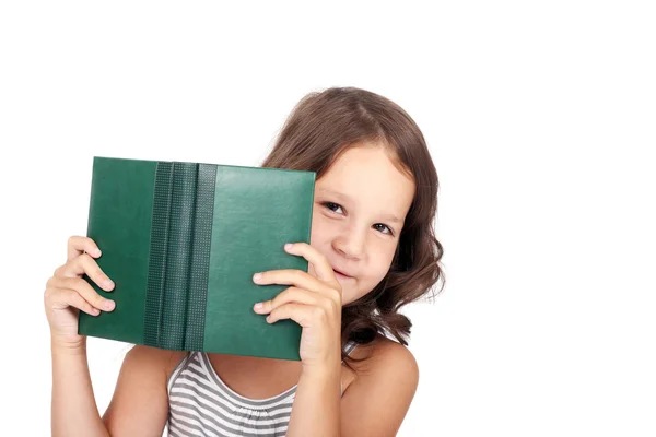 Kind op zoek uit het boek — Stockfoto