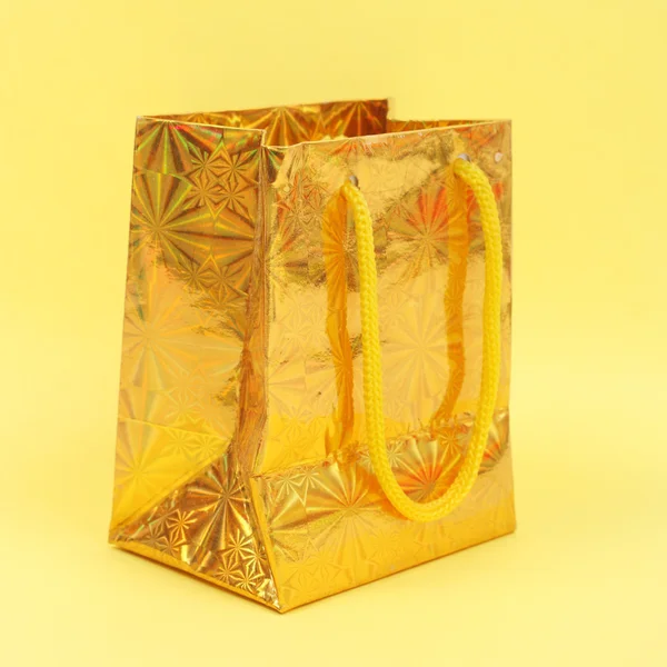 Gold gift parcel — Stock Photo, Image