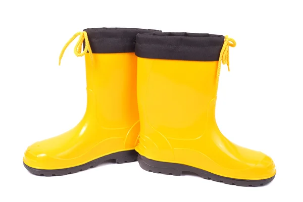 Žluté gumové boty — Stock fotografie