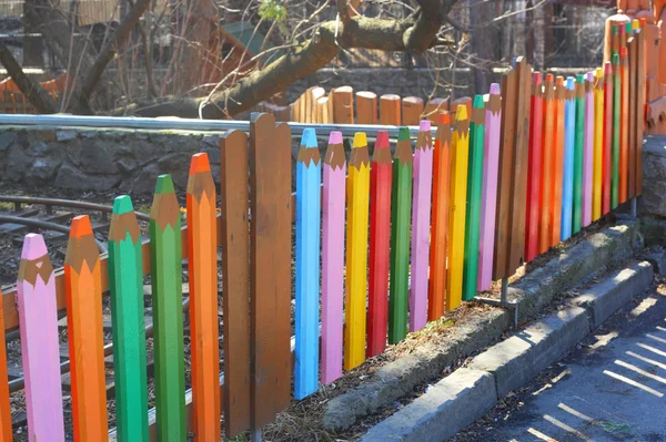 Color pencils fence — Stock Photo, Image