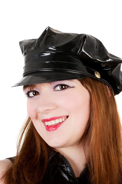Дівчина в поліцейській шапці — стокове фото