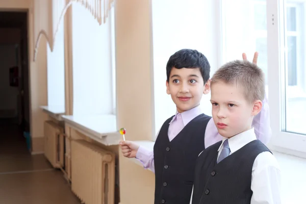 Cute little boys in the school — Stock Photo, Image