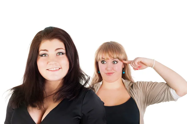 Girl making fun on her friend — Stock Photo, Image