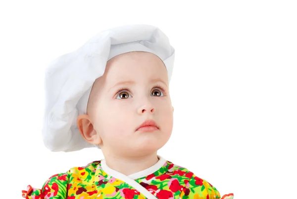 Lilla baby i cook cap — Stockfoto