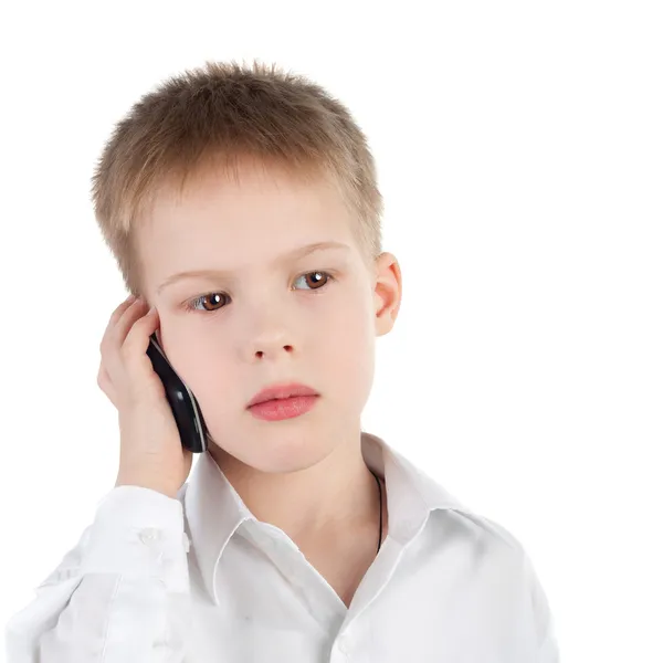 Jongen met een mobiele telefoon — Stockfoto