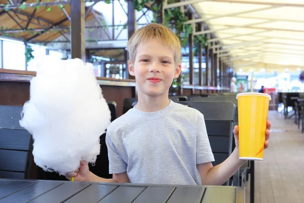 Little boy with cotton candy — Stock Photo, Image
