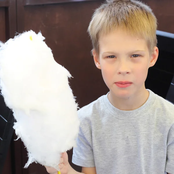 Little boy with cotton candy — Stock Photo, Image