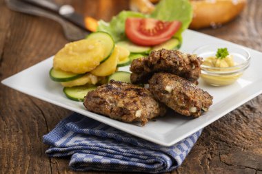 bavarian minced meat fleischpflanzerl with salad 