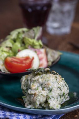 rustic spinach dumpling with salad