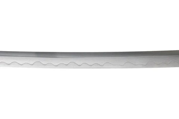 白を基調とした日本刀の刃 焦点を合わせて 刃先の波状の模様は 刃が折れないように鍛冶屋が作る硬さの線です それぞれの作品はユニークです — ストック写真