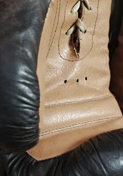 Brown old boxing gloves — Stock Photo, Image