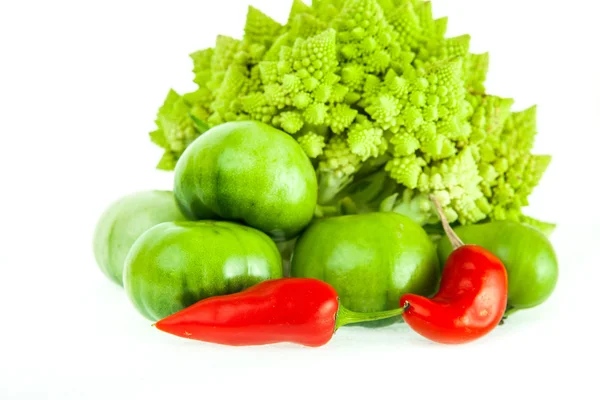 Romanesco broccoli, green tomatoes and red pepper — Stock Photo, Image