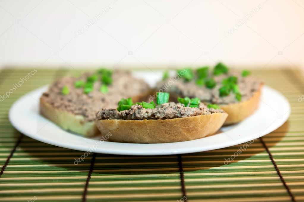 Sandwich with liver cheese spread and chopped green onions