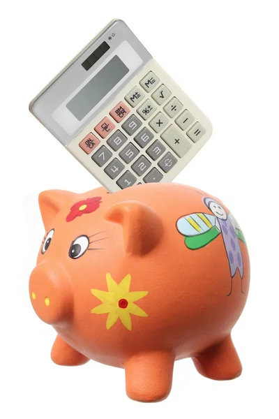 Piggybank e calculadora — Fotografia de Stock