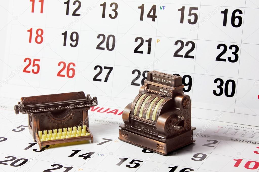 Cash Register and Typewriter on Calendar Pages