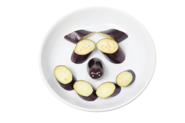 Patlıcan dilimleri yüz şeklinde düzenlenmiş — Stok fotoğraf