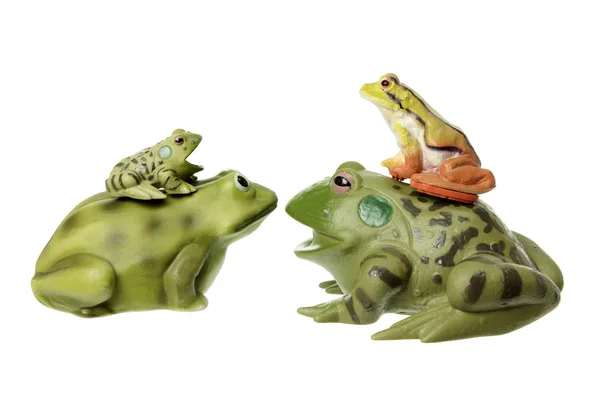 Миниатюрные игрушечные лягушки — стоковое фото