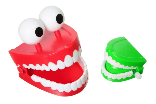 Csattogtatás fogai játékokkal — Stock Fotó