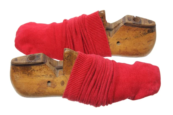 Schuh und rote Socken — Stockfoto