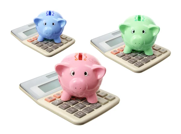 Piggybanks e calculadoras — Fotografia de Stock