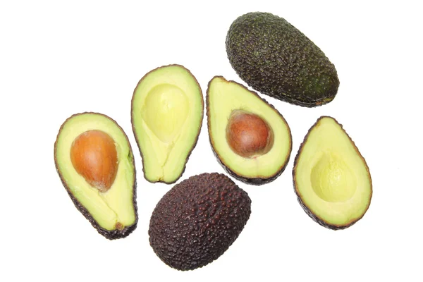 Aguacates cortados por la mitad — Foto de Stock