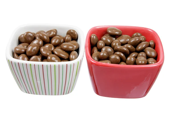 Chocolate Coated Raisins in Bowls Royalty Free Stock Photos