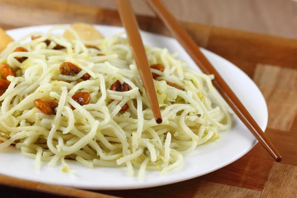 Cooked noodles with chopsticks — Stock Photo, Image