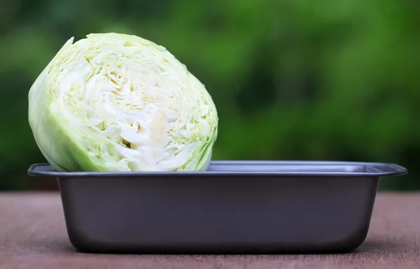 Cabbage on a metal container — Stock Photo, Image