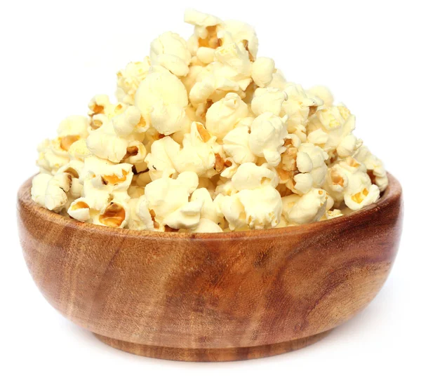 Popcorns on wooden bowl — Stock Photo, Image