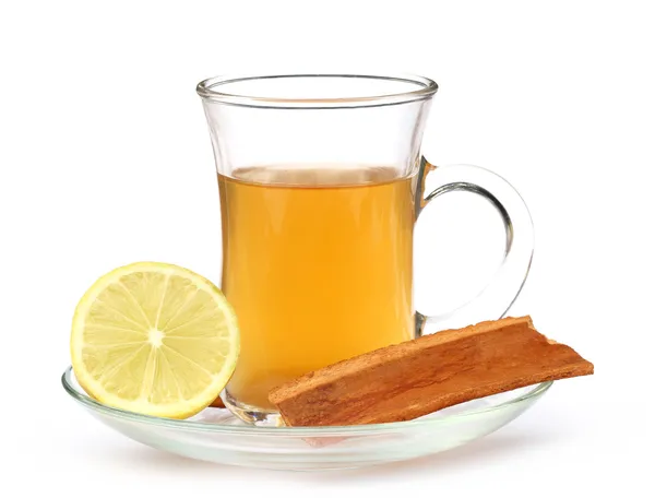 Taza de té de hierbas con corteza de limón y canela — Foto de Stock
