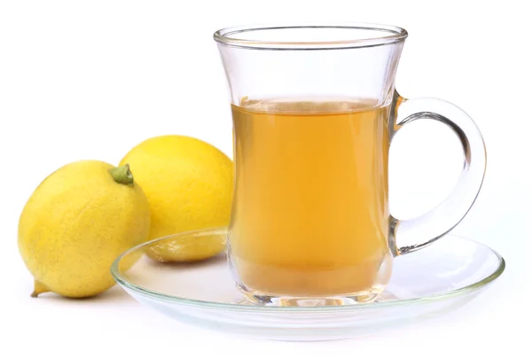 Cup of tea with whole lemon — Stock Photo, Image
