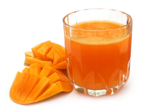 Mango juice with sliced fruit Stock Photo