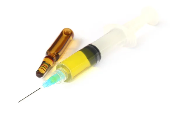 Hypodermic syringe with ampule — Stock Photo, Image