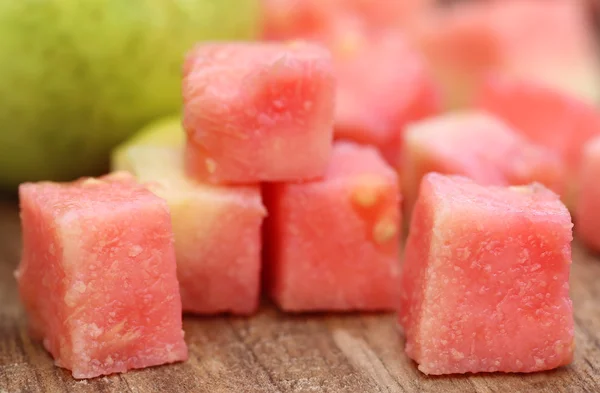 Fresh guava on wooden surface — Stock Photo, Image
