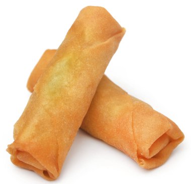 Sebzeler beyaz arkaplanda yuvarlanıyor