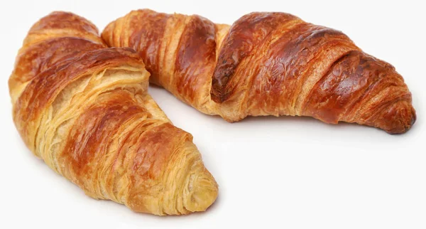 Fechar Croissant Saboroso Sobre Fundo Branco — Fotografia de Stock