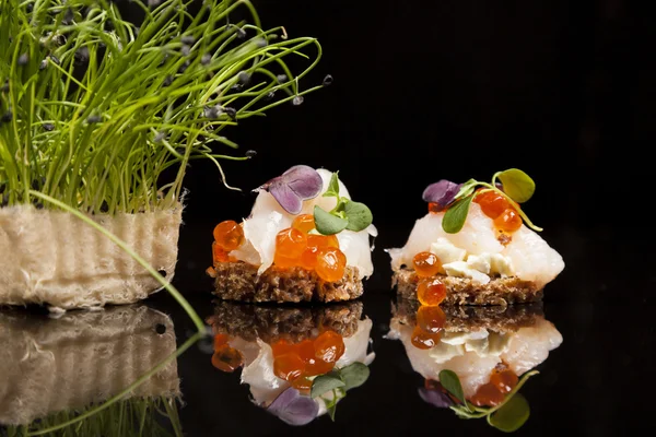 Salmon, cheese, and herbs canapes — Stock Photo, Image