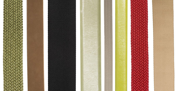 Closeup of various leather and fabric belts