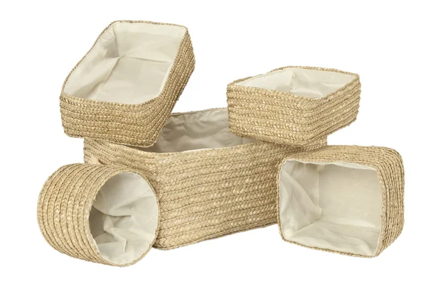 Various braided bamboo baskets on white — Stock Photo, Image