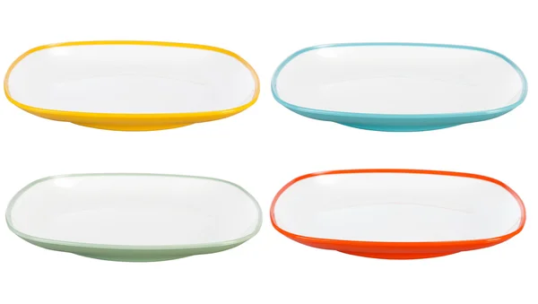 Colored plastic plates on white background — Stock Photo, Image