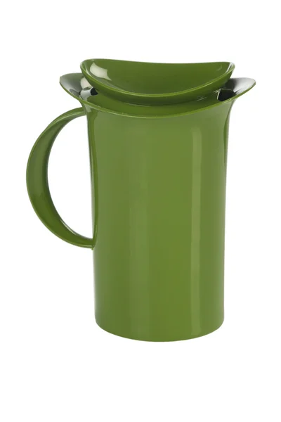 Caneca de plástico verde no fundo branco — Fotografia de Stock