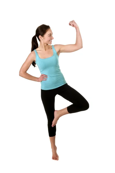 Young woman showing her muscles — Stock Photo, Image