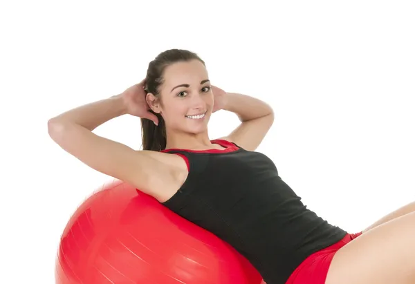 Женщина с гимнастическим мячом — стоковое фото