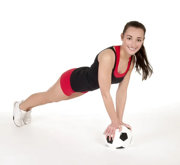 Frau mit Fußball — Stockfoto