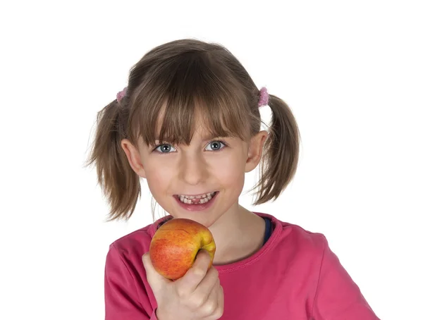 Bambina con una mela — Foto Stock