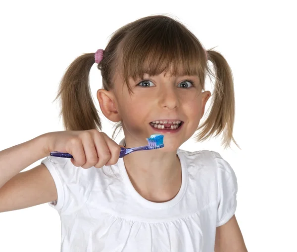 Jovem menina escovação dentes — Fotografia de Stock