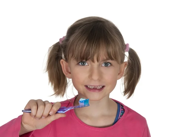 Niñita cepillándose los dientes —  Fotos de Stock